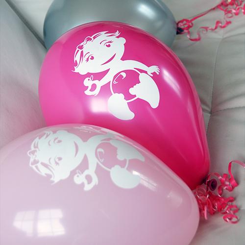Blauw en roze ballonnen voor tweeling